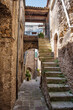 Castelvecchio Calvisio medieval town, narrow streets, steps, archs and medieval buidings
