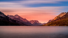 Long Exposure Of A Sunset Over Upper Waterton Lake In Waterton Lakes National Park In The Canadian Rockies Just North Of The US Border