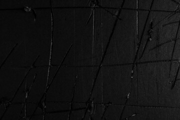 Wall Mural - Black scratched cracked old paper. Damaged rough cardboard
