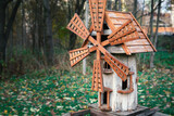 Model of an old wooden wind mill on a children's playground