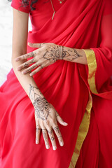 Wall Mural - Beautiful Indian woman with henna tattoo at home