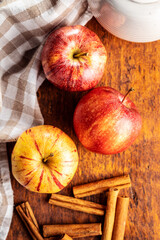 Wall Mural - Fresh autumn apples and cinnamon sticks