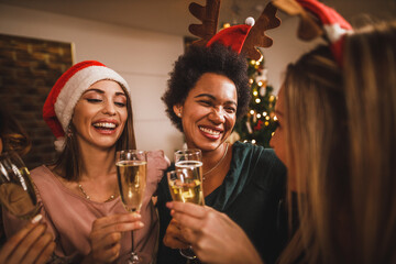 Sticker - Multi ethnic Female Friends Making Toast As And Having Fun During Christmas Party At Home