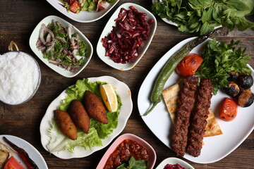 adana kebab and salad varieties