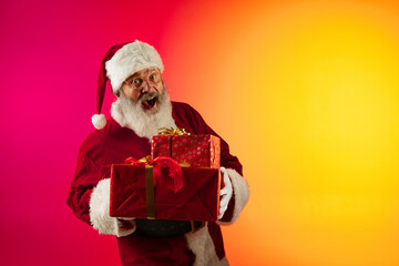 Portrait of happy smiling Santa Claus. Christmas celebration concept. Emotional face of Santa Clause in glasses.