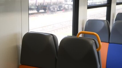 Wall Mural - Interior view of the train interior with empty seats