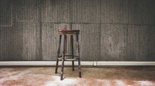 Vintage Chair With Galvanized Wall And Concrete Floor Background. Copy Space.