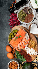 Wall Mural - Assortment of omega 3 best sources on dark background.
