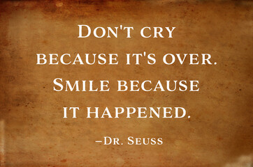 Inspirational and motivational quote saying - Don't cry .because it's over. Smile because it happened. - Dr. Seuss