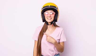 Poster - young pretty woman with a motorbike helmet.