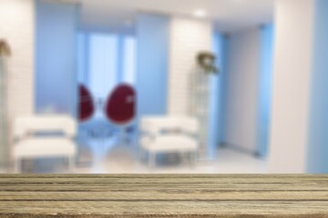 Wall Mural - wood table top with blur kitchen room background