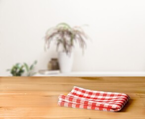 Wall Mural - Empty wooden desk with a napkin in kitchen interior