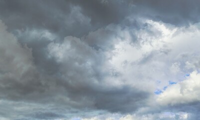 Canvas Print - Dark storm clouds in the sky before the rain. Dark gray dust clouds