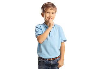 Poster - Cheerful child gesutring silence with finger