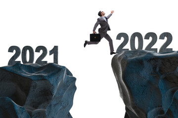 Man jumping from year 2021 to 2022