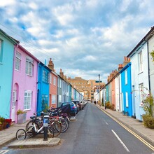 Pastel Houses On Brighton Street With Parked Bikes