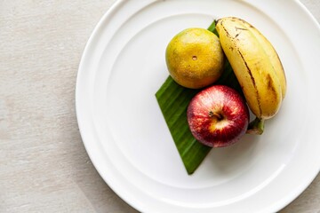 Sticker - Mixed fruit plate on white wood table