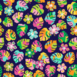 Colorful hibiscus and tropical leaf vector seamless pattern background.