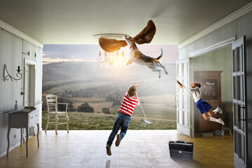 Wall Mural - Boy with a dog flying through the air with his ears