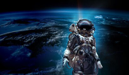 Wall Mural - astronaut walking on an unexplored planet