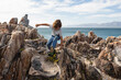 © Marc Romanelli - 8 year old boy playing with toy safari vehicle, De Kelders,South Africa