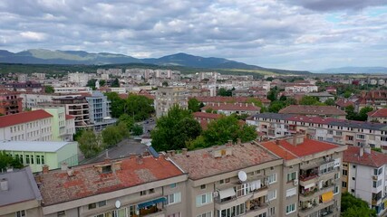 Wall Mural - Drone video of Kazanlak town in Stara Zagora Province at the foot of the Balkan mountain range of Bulgaria