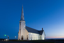 Blue Hour Sunset View Of Historic 1881 St. Pierre-de-la-Verniere Church In Cap-aux-Meules, Magdalen Islands, Quebec, Canada