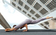 © ADDICTIVE STOCK - Unrecognizable woman doing flying man asana
