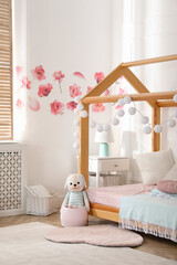 Sticker - Stylish child room interior with wooden house bed