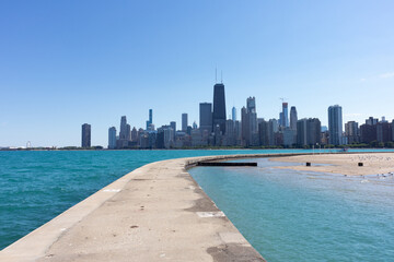 Wall Mural - Chicago Skyline seen from a Curving Walkway at North Avenue Beach along Lake Michigan during the Summer