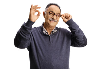 Poster - Mature man holding his glasses and gesturing ok sign