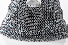 Steel Helmet With Chain Mail To Protect Head. Iron Steel Ammunition, Personal Accessories For A Knight: Helmet, Chain Mail, Limb Protection. Concept Is A Reconstruction Of Battles.