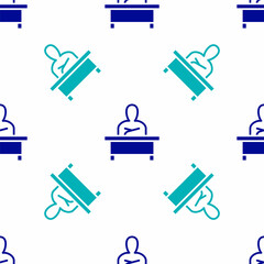 Poster - Blue Schoolboy sitting at desk icon isolated seamless pattern on white background. Vector