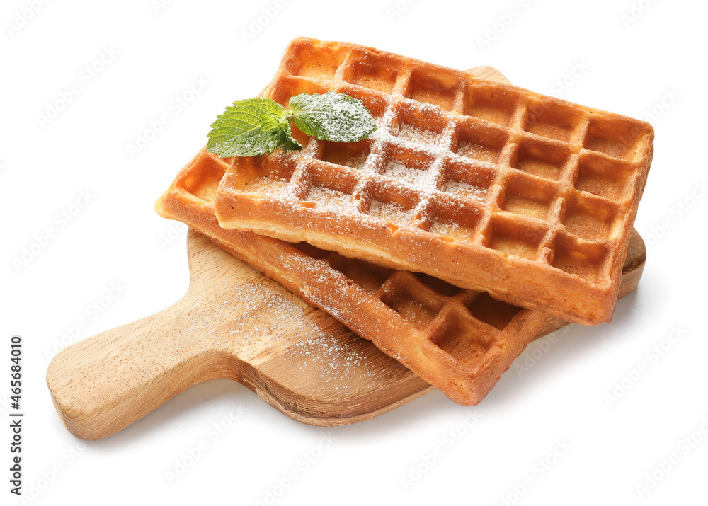 Board with yummy Belgian waffles and mint on white background