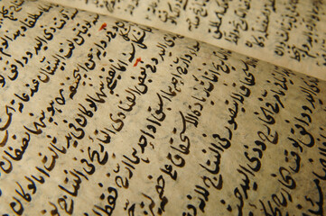 Ancient open book in arabic. Old arabic manuscripts and texts