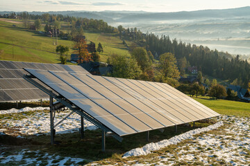 Wall Mural - photovoltaic panels on a mountain meadow in the autumn morning