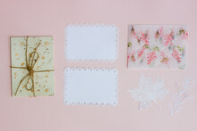 Vintage Cards For Invitation Or Congratulation With Flowers And Envelope Over The Pink Background.