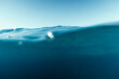 Split View Half Over and Under Ocean Surface whit Clear Sky. Background Concept