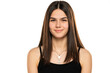 portrait of a beautiful smiling teenage girl with long straight hair and no makeup