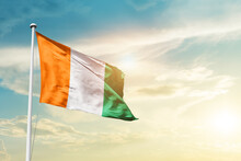 Cote D Ivoire National Flag Cloth Fabric Waving On The Sky - Image