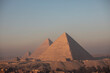 pyramids of giza at sunset