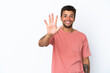 Young handsome Brazilian man isolated on white background counting five with fingers
