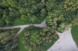 Urban park with meadow, trees and paths. Top view
