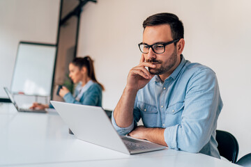 businessman reading report in the office