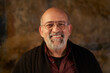 © CarlosBarquero - Portrait of a middle-aged Caucasian smiling man looking at camera. Look of an older person