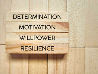 Wall Mural - Inspirational and Motivational Concept - determination motivation willpower resilience text background. Stock photo.