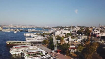 Poster - A beautiful aerial view of busy streets, boats parking high traffic