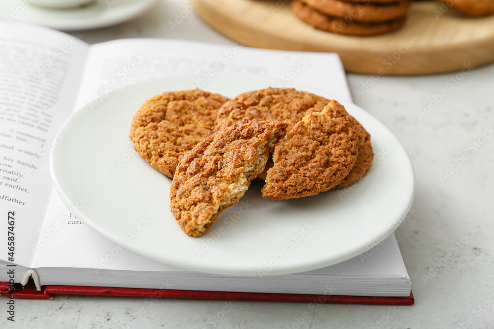 Plate with tasty hojicha cookies on white background