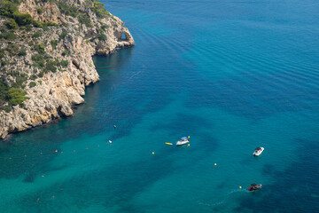 boats on the blue Mediterranean sea beautiful summer vacation and sunny beach in Spain