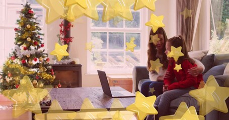 Poster - Animation of stars falling over happy caucasian mother and daughter having video call at christmas